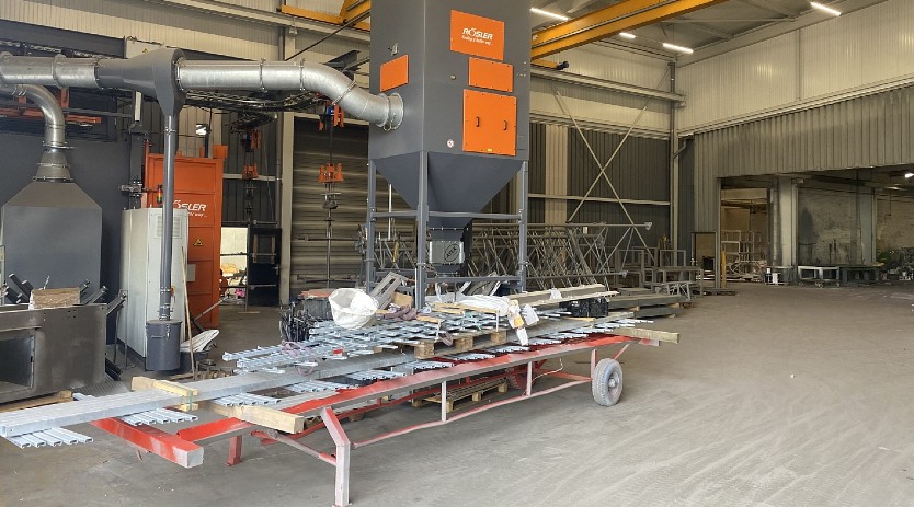 Spinner hanger blast machine eliminates capacity bottleneck in  the paint preparation  